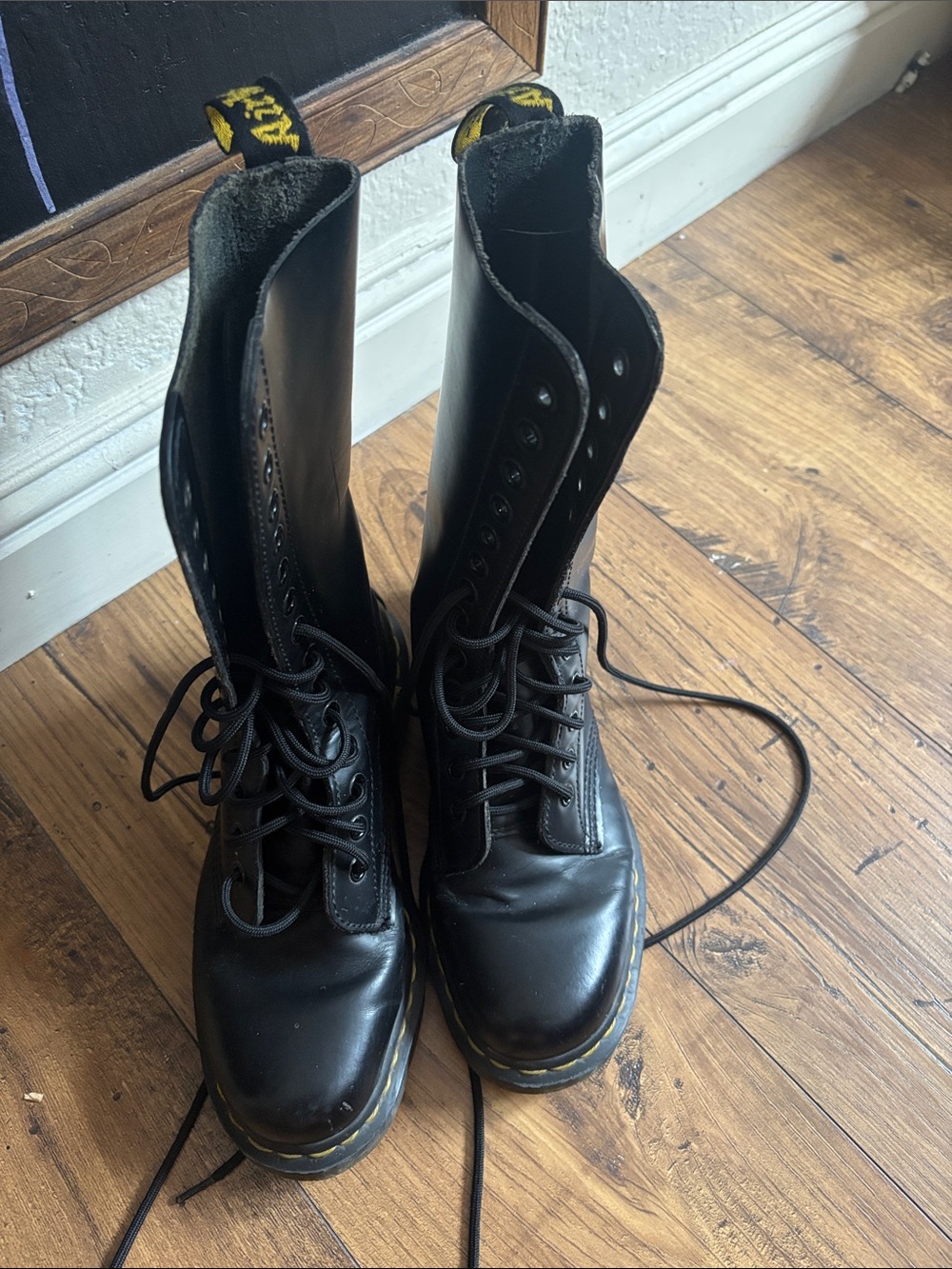 Dr. Martens Black Leather 14-Eye Lace-Up Boots with Yellow Stitching